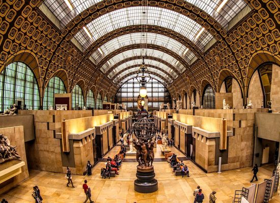 Exterior view of the Musée d'Orsay in Paris, showcasing its grand architecture and iconic glass roof. best time to visit musee d'orsay