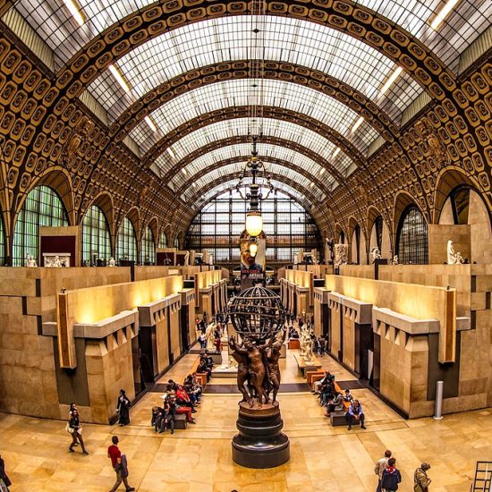 Exterior view of the Musée d'Orsay in Paris, showcasing its grand architecture and iconic glass roof. best time to visit musee d'orsay