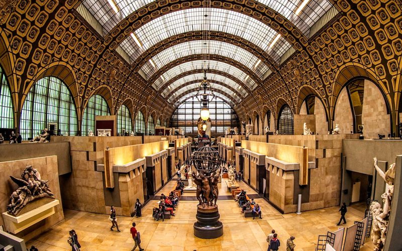 Exterior view of the Musée d'Orsay in Paris, showcasing its grand architecture and iconic glass roof. best time to visit musee d'orsay