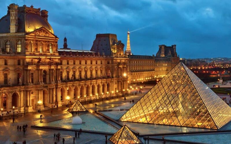 history of the louvre museum in paris france - Louvre Museum with glass pyramid and historical palace in Paris, France