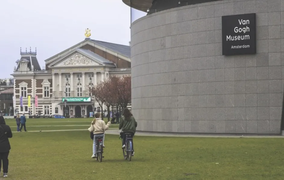 tourist in bike parking area - How to Get to Van Gogh Museum