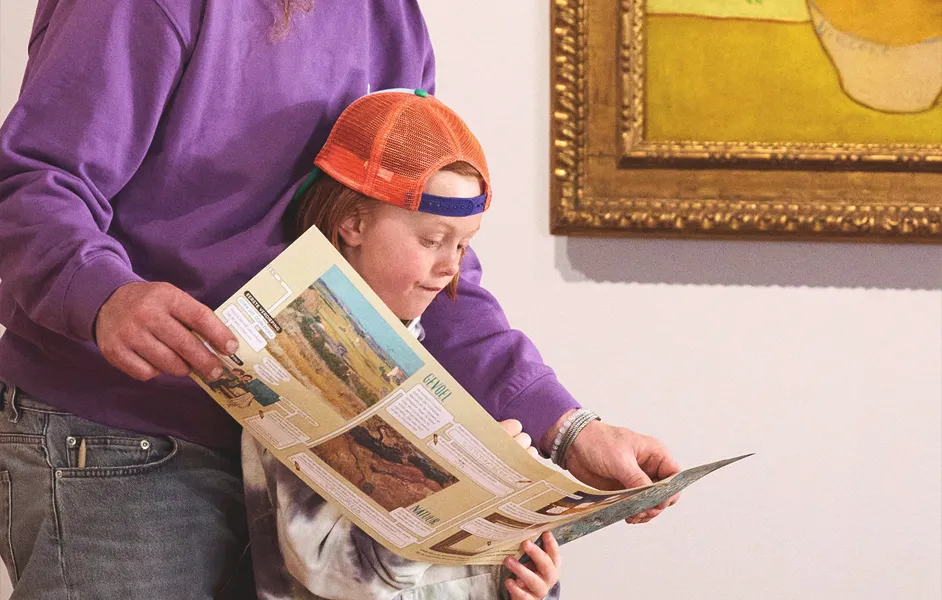 Van Gogh Museum with Kids - Kids holding postcards