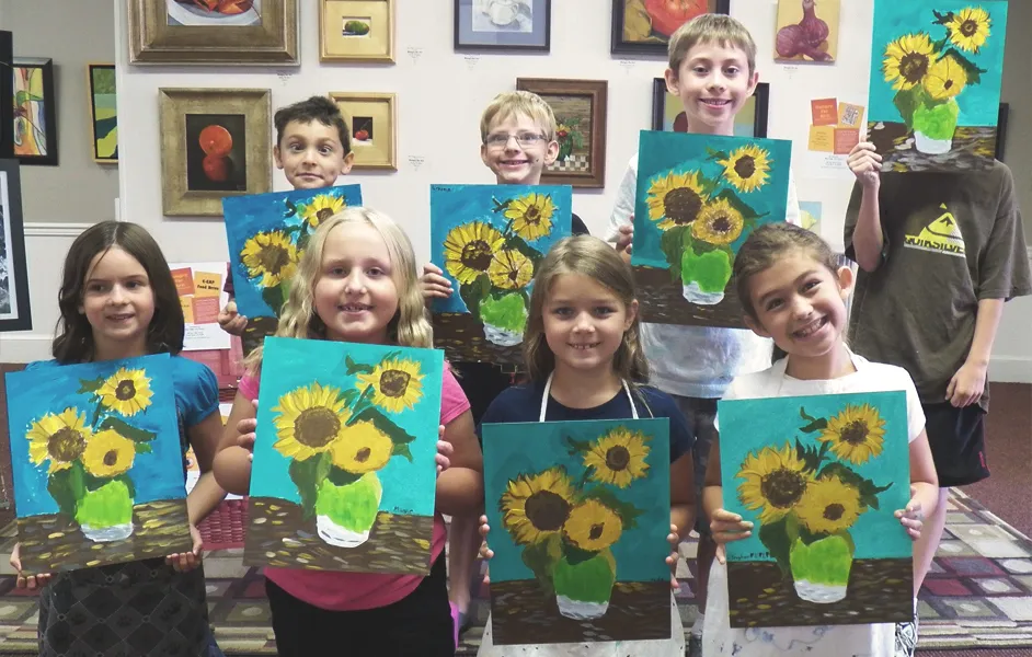 sketching in front of a Van Gogh artwork